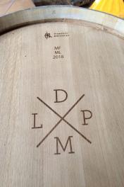 Barrel with the Petit Malo logo etched on
